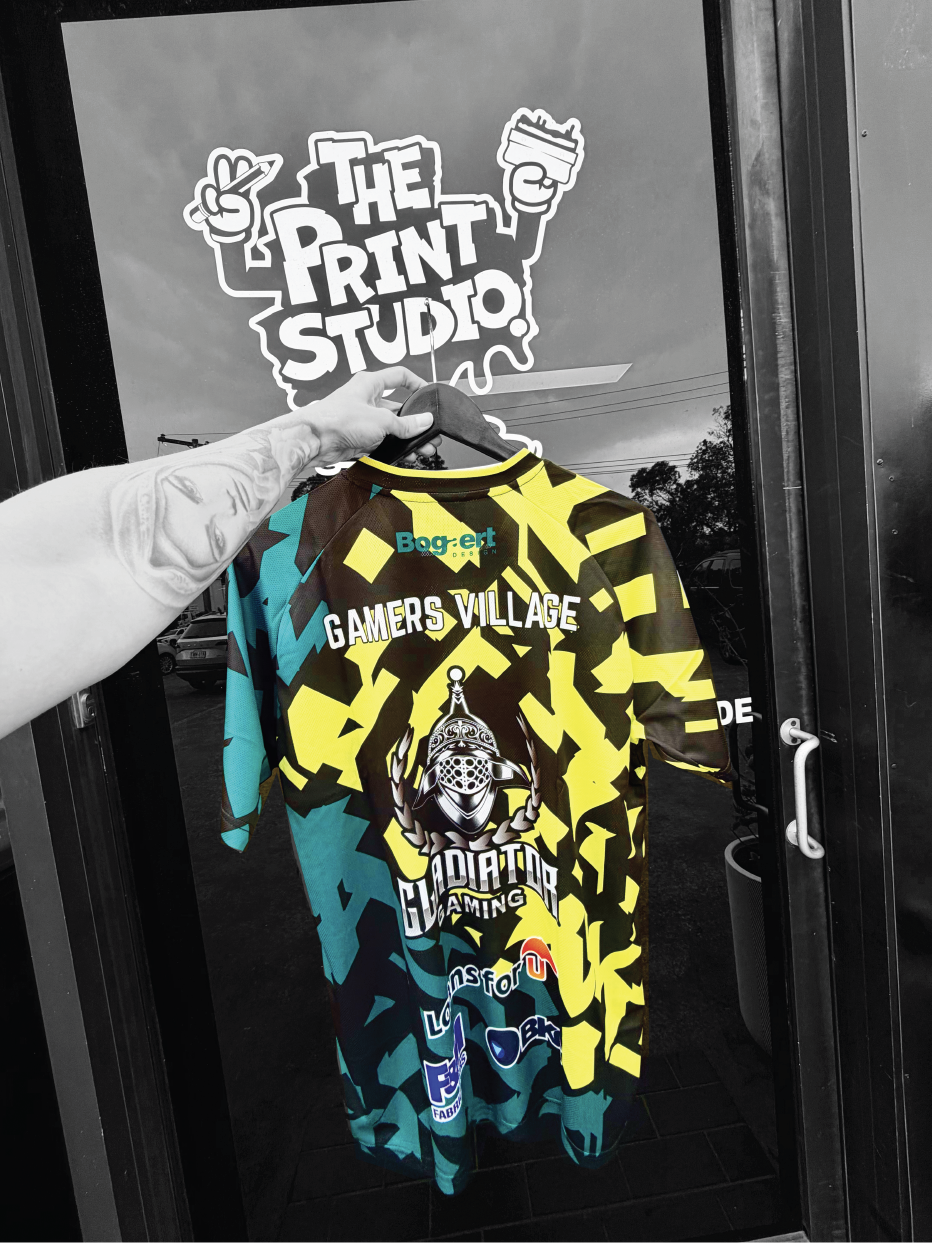 Arm holding the back of a sublimation shirt