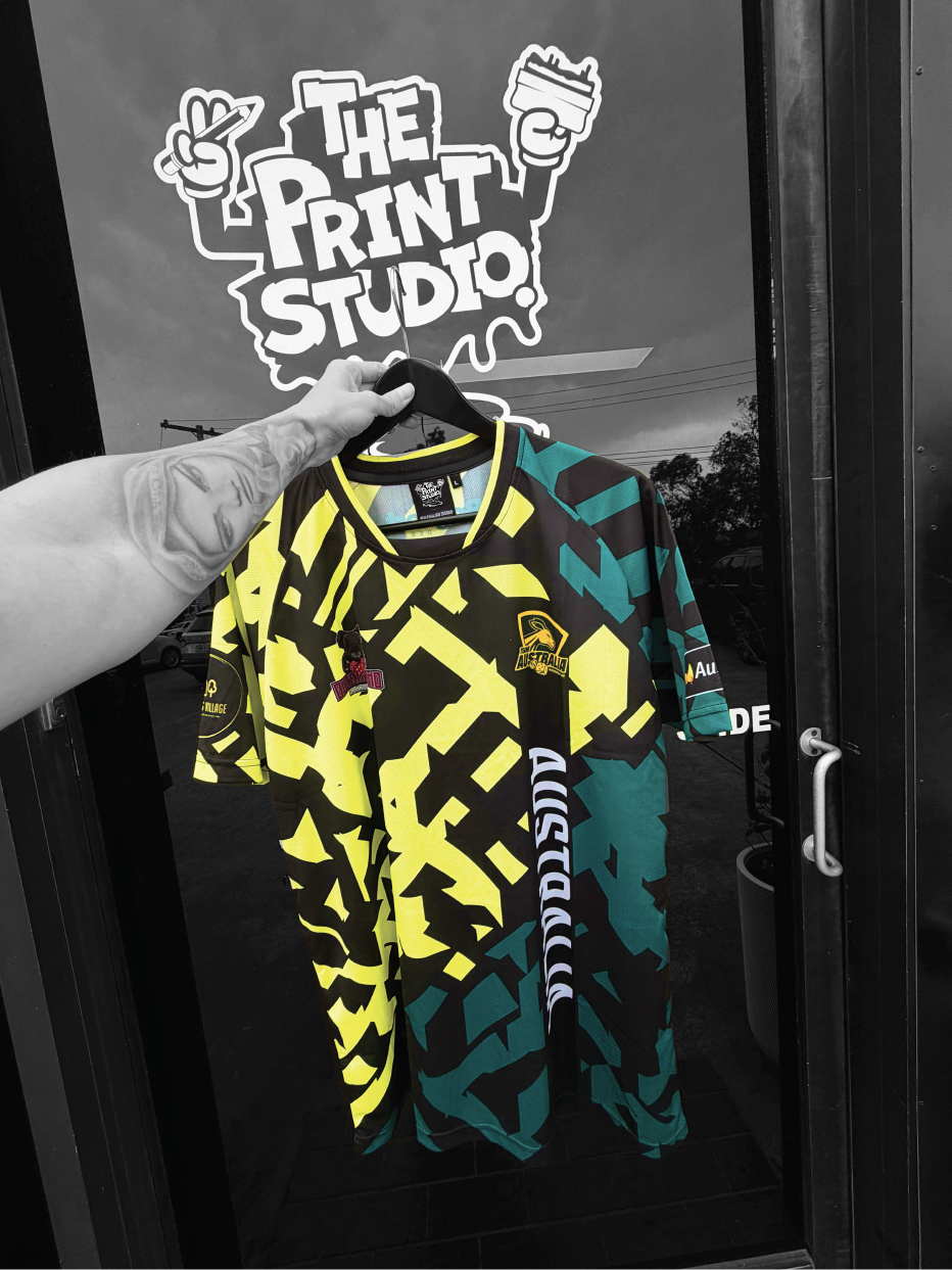 Arm holding a sublimation shirt