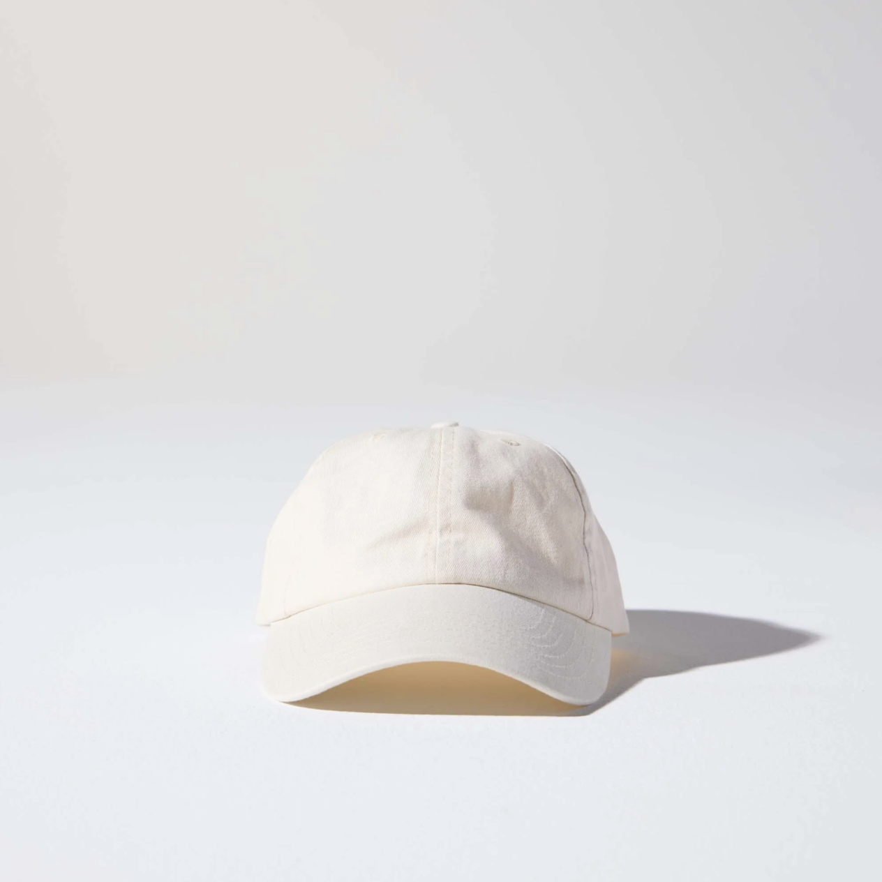 Cream Front Friday Buckle Cap