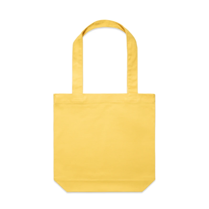1001_CARRIE_TOTE_SUNSET__44382 Yellow tote bag with two handles, simple design on a white background.