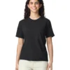 Woman in a black short-sleeve T-shirt smiling at the camera (studio shot). 藍
