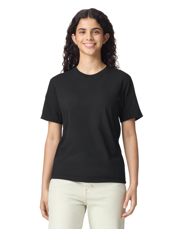 Woman in a black short-sleeve T-shirt smiling at the camera (studio shot). 藍
