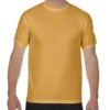 Front view of a man wearing a mustard yellow crew-neck T-shirt, short sleeves, plain design.