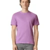 Male model wearing a lavender short-sleeve T-shirt, standing against a white background.