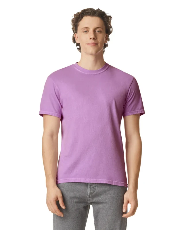Male model wearing a lavender short-sleeve T-shirt, standing against a white background.