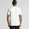 5026G_CLASSIC_ORGANIC_TEE_BACK__32053 Man standing with back to the camera wearing a plain white short-sleeve T-shirt; tattoos visible on both arms?