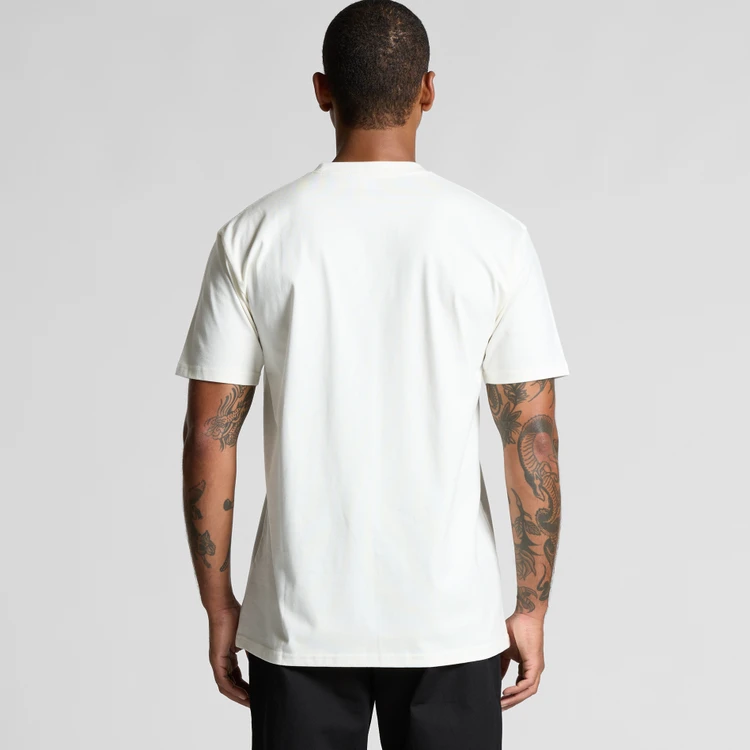 5026G_CLASSIC_ORGANIC_TEE_BACK__32053 Man standing with back to the camera wearing a plain white short-sleeve T-shirt; tattoos visible on both arms?