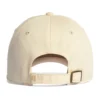 CCWC0-ivory-back Back view of a beige canvas baseball cap with an adjustable strap and brass buckle.
