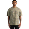 Heavy Faded Camo Tee 5082 Man standing against a white background, wearing a green camouflage short-sleeve T-shirt with a neutral expression.