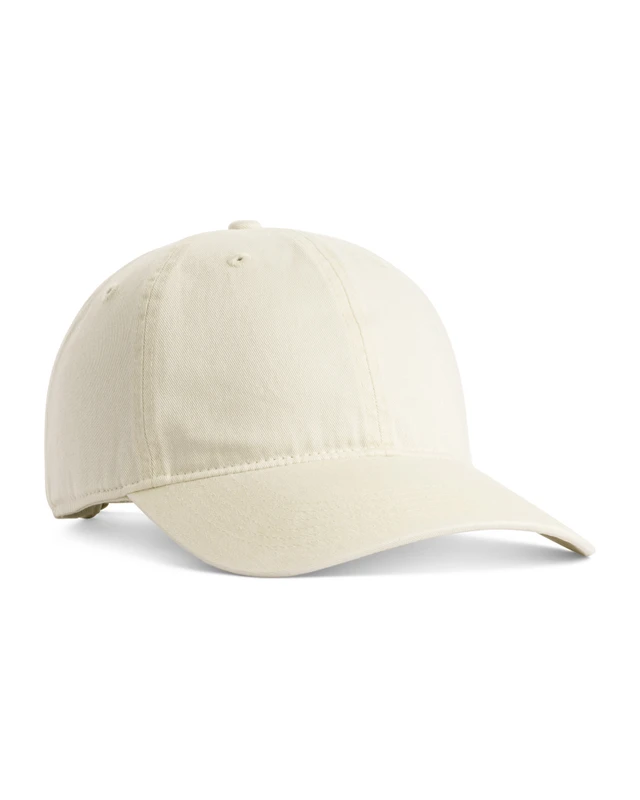 ccsc0-ivory Cream-colored baseball cap with a curved brim, shown in a left-side profile view